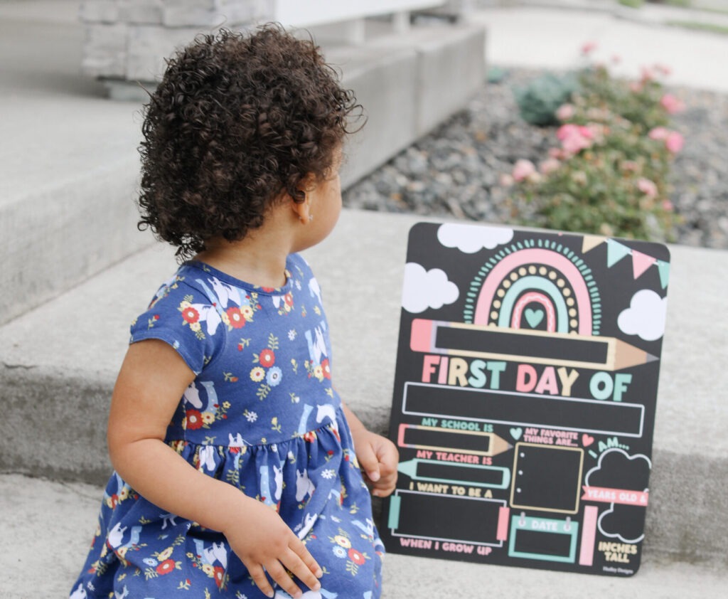 Toddler first day of pre-k with sign and starting daycare