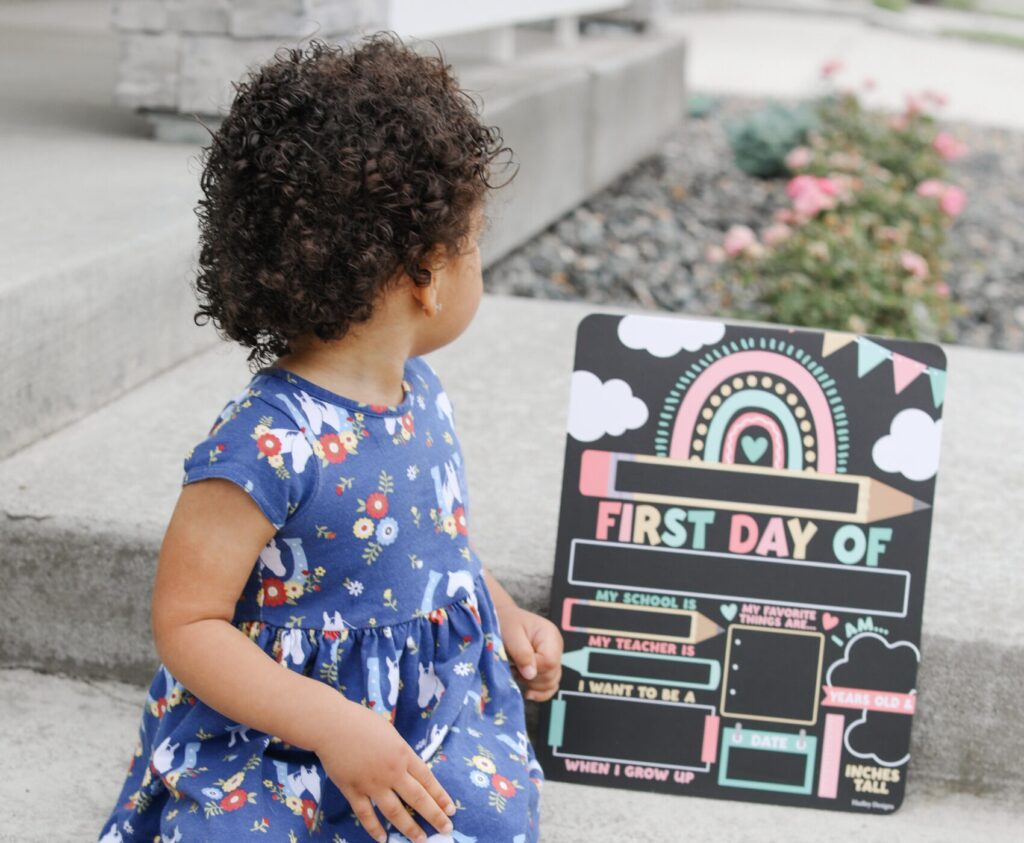 Toddler first day of pre-k with sign and starting daycare