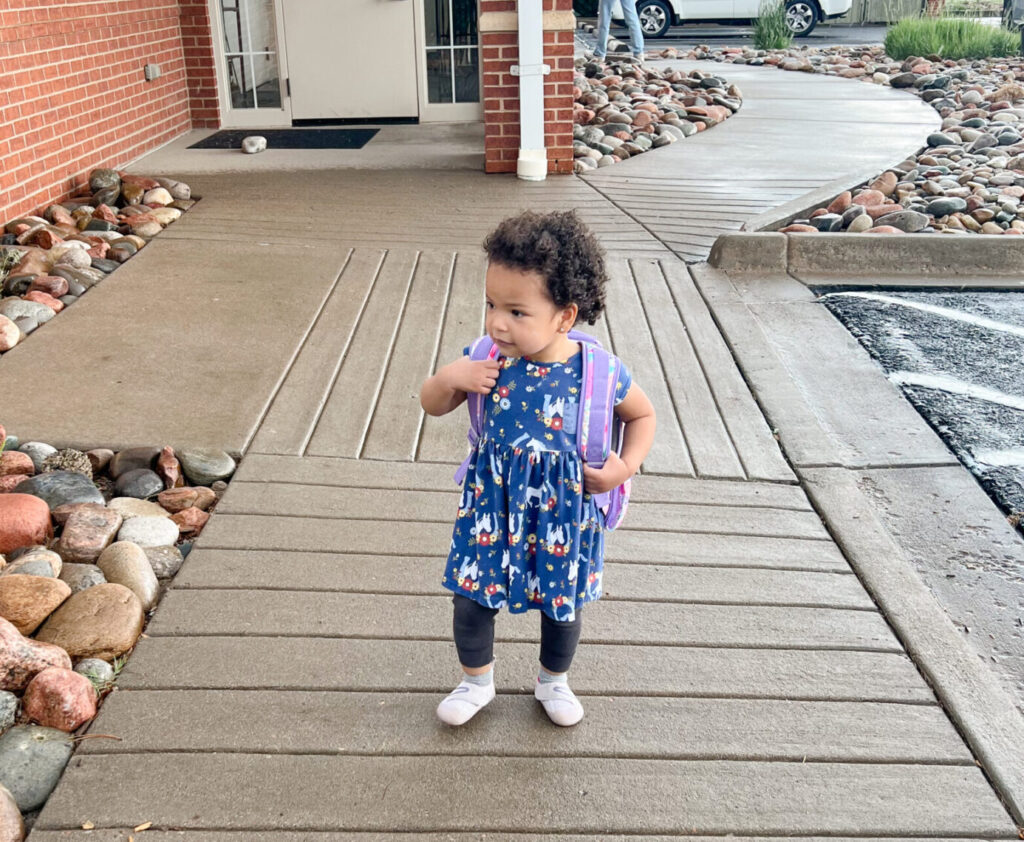 2 year old walking out of school after starting daycare