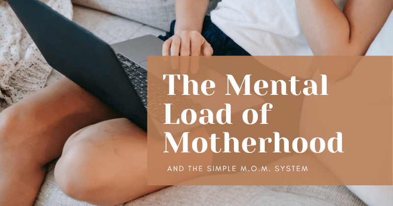 A handwritten brain dump on a notebook, the first step to clearing the mental load of motherhood