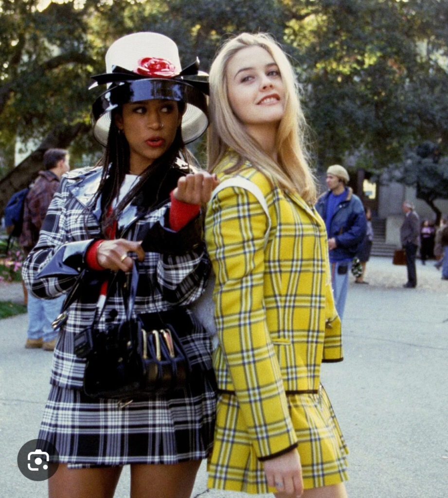 Cher and Dionne from the movie Clueless in classic plaid outfits.