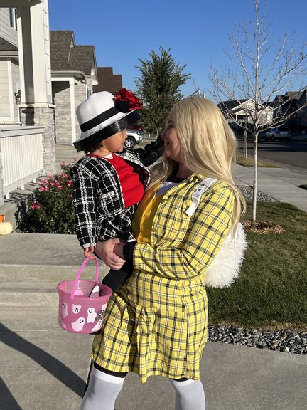 Mommy and me Cher and Dionne Halloween costume with mom in yellow plaid and toddler in a tweed jacket and hat